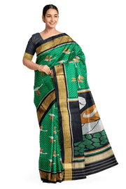 Handwoven Patola pure silk saree in green  with bird motifs