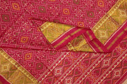 Handwoven Patola pure silk saree  in red in pan bhat pattern.