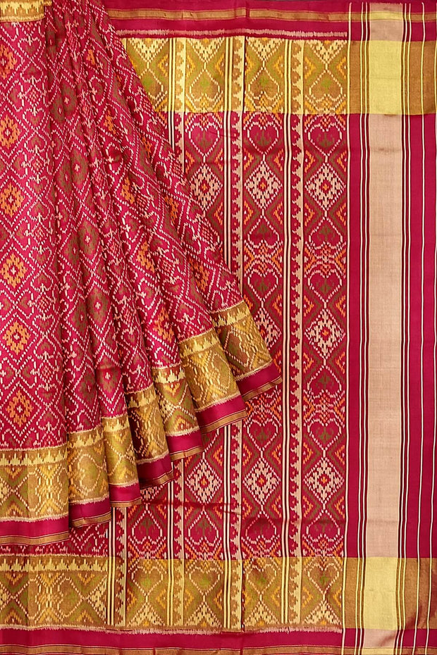 Handwoven Patola pure silk saree  in red in pan bhat pattern.