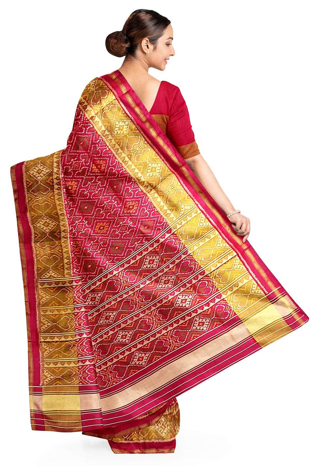 Handwoven Patola pure silk saree  in red in pan bhat pattern.