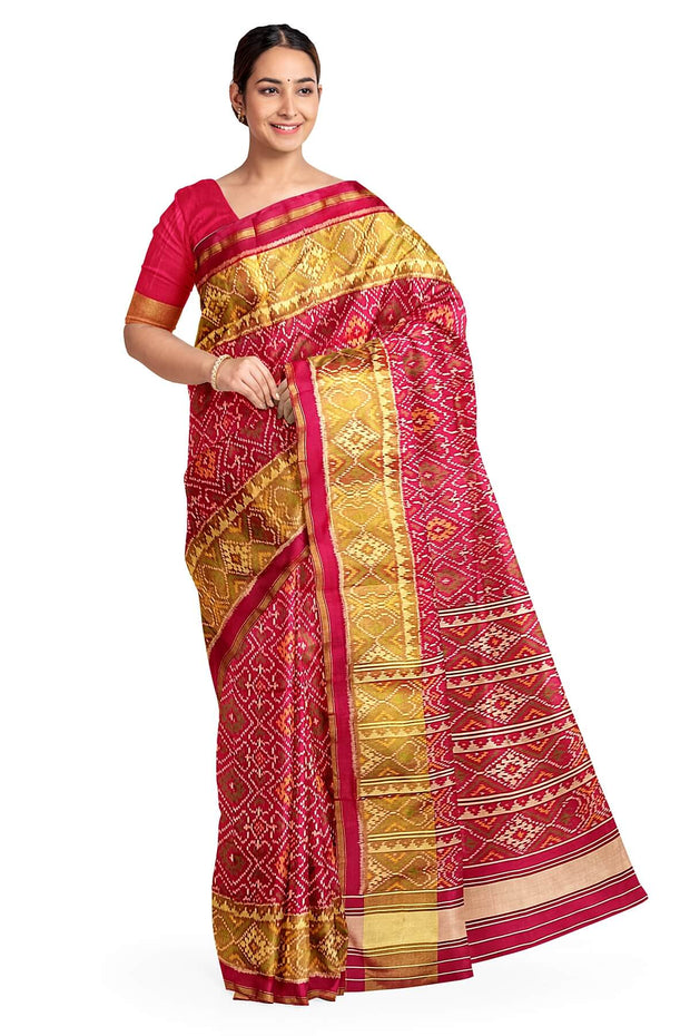 Handwoven Patola pure silk saree  in red in pan bhat pattern.