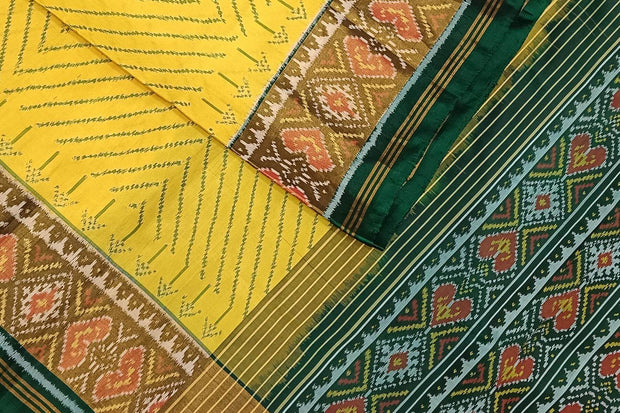 Handwoven Patola pure silk saree in yellow in zig zag  pattern