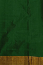 Handwoven Patola pure silk saree in green with small motifs and a skirt border