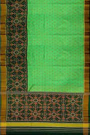 Handwoven Patola pure silk saree in green with small motifs and a skirt border