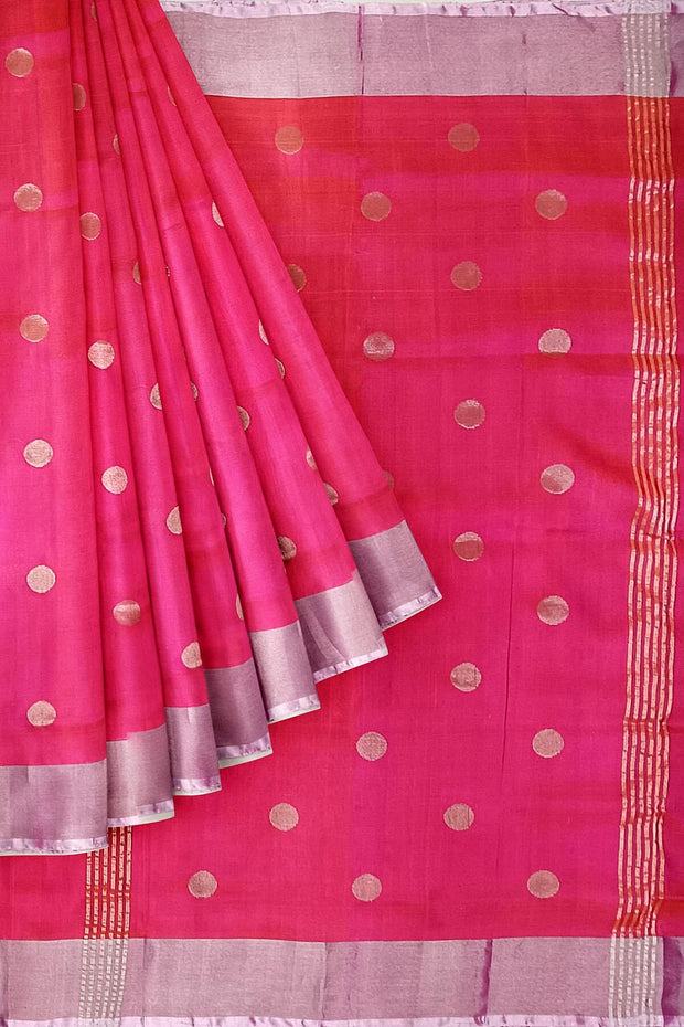 Handwoven Uppada pure silk saree in  orangish pink  with round motifs.