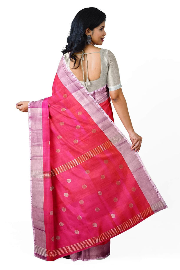 Handwoven Uppada pure silk saree in  orangish pink  with round motifs.