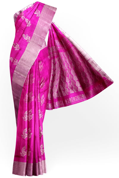 Handwoven Uppada pure silk saree in rani pink with floral motifs.