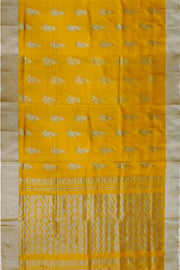 Handwoven Uppada pure silk saree in yellow with floral motifs .