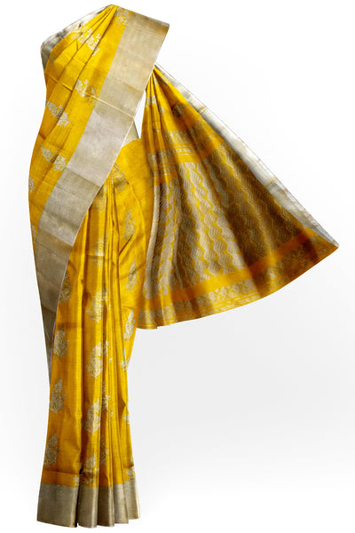 Handwoven Uppada pure silk saree in yellow with floral motifs .