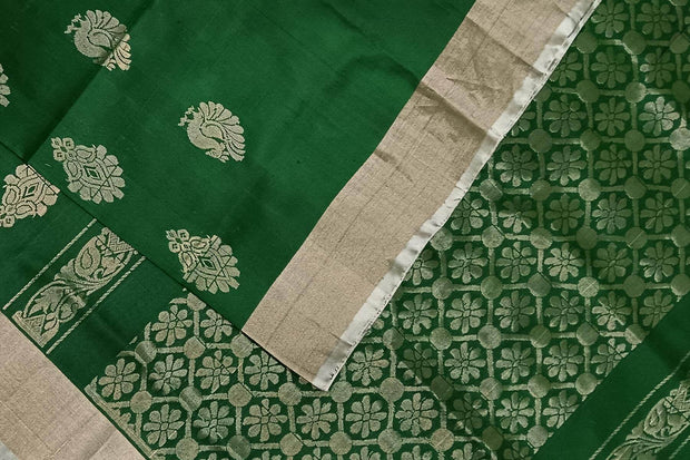 Handwoven Uppada pure silk saree in bottle green with floral motifs