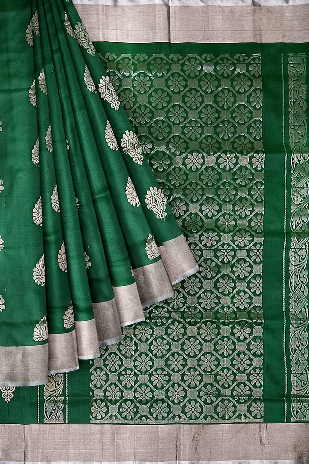 Handwoven Uppada pure silk saree in bottle green with floral motifs