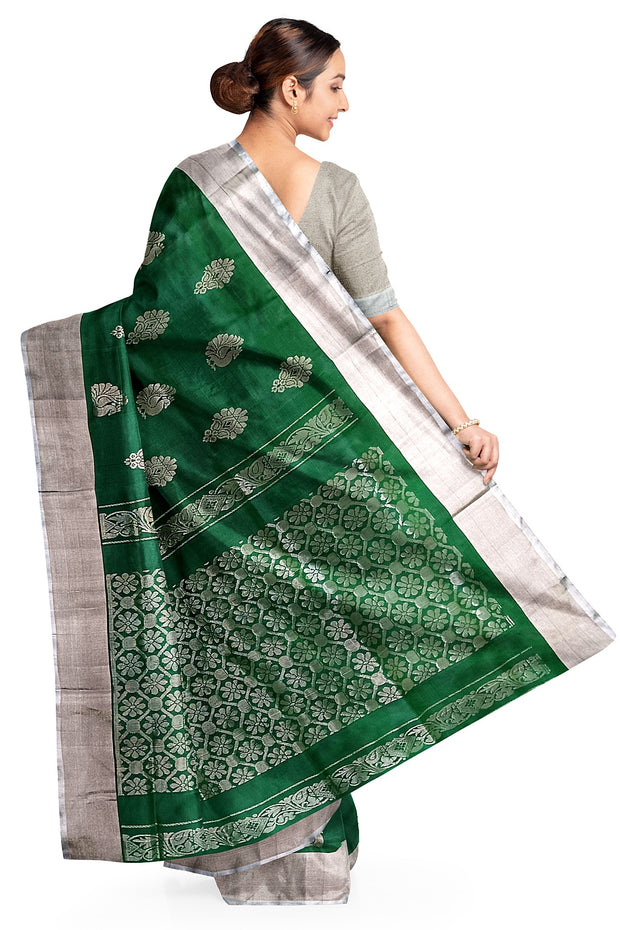 Handwoven Uppada pure silk saree in bottle green with floral motifs