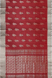 Handwoven Uppada pure silk saree in maroon with floral motifs.