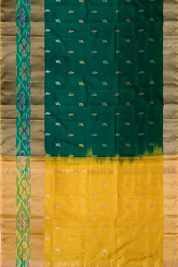 Handwoven Uppada pure silk saree in bottle green with Pochampally border.