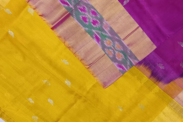 Handwoven Uppada pure silk saree in purple with Pochampally border.