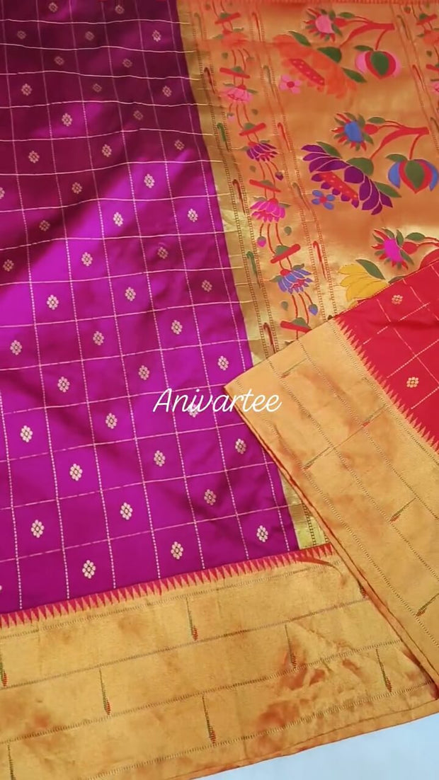 Paithani pure silk saree in purple with checks & buttis on the body .