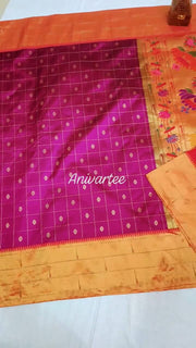 Paithani pure silk saree in purple with checks & buttis on the body .